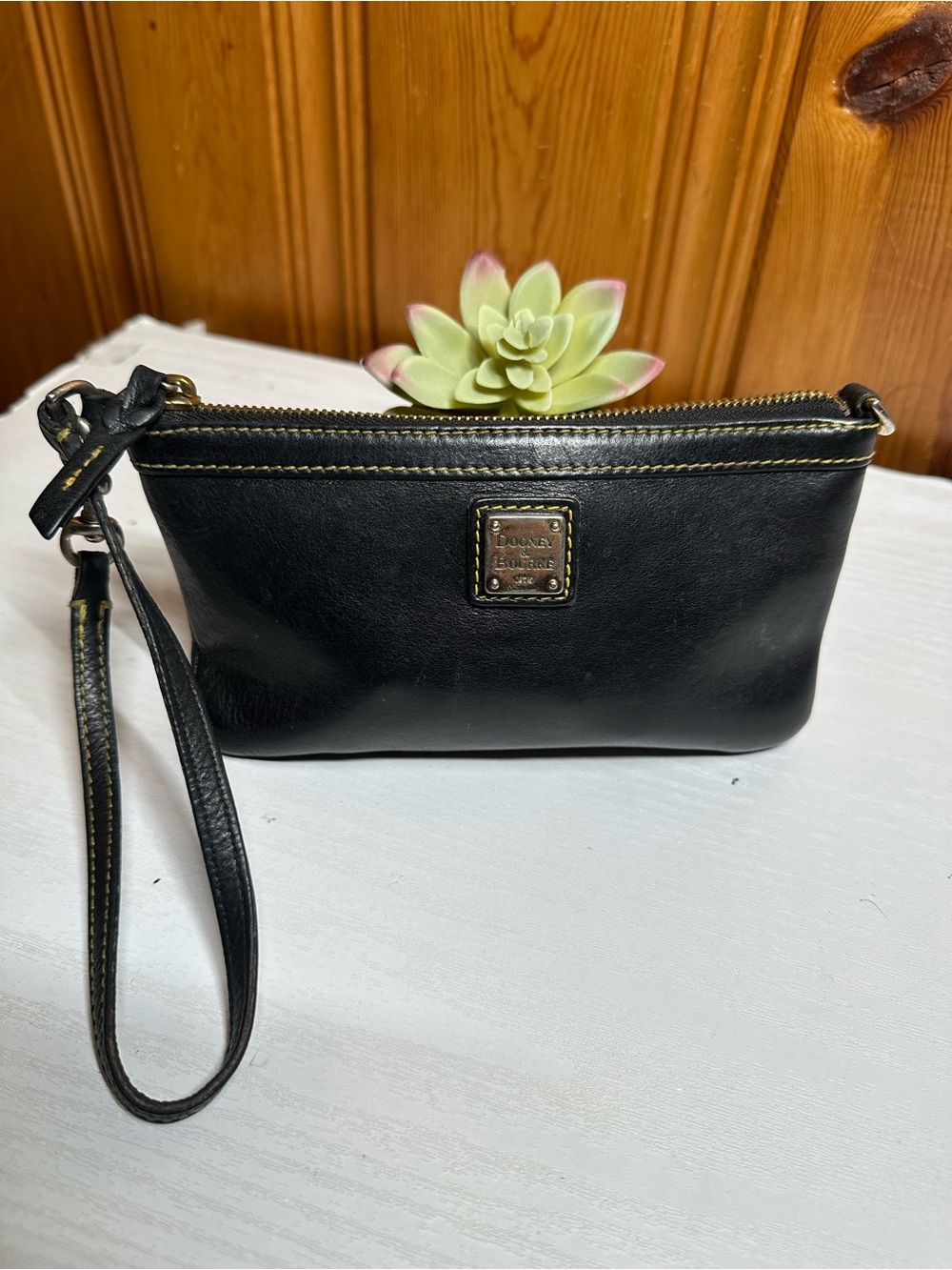 Dooney & Bourke Black Leather Wristlet Clutch with Gold Plaque